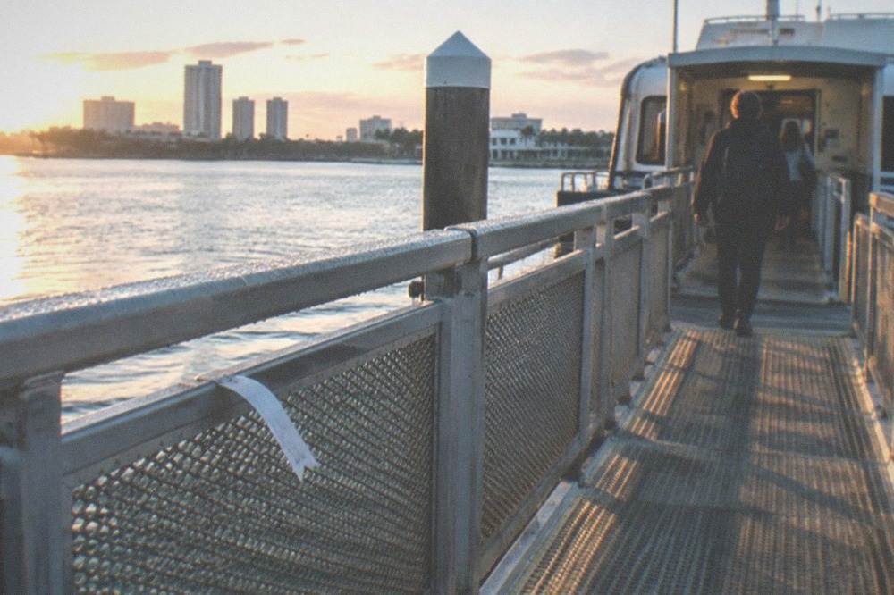 Boarding gangway at a ferry terminal with morning light