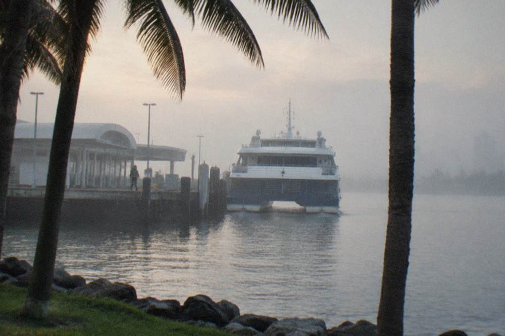 High speed ferry at a cruise terminal dock in early morning light