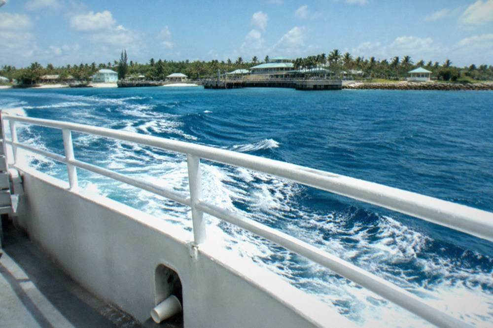 Open deck of a high speed ferry mid crossing over open blue water